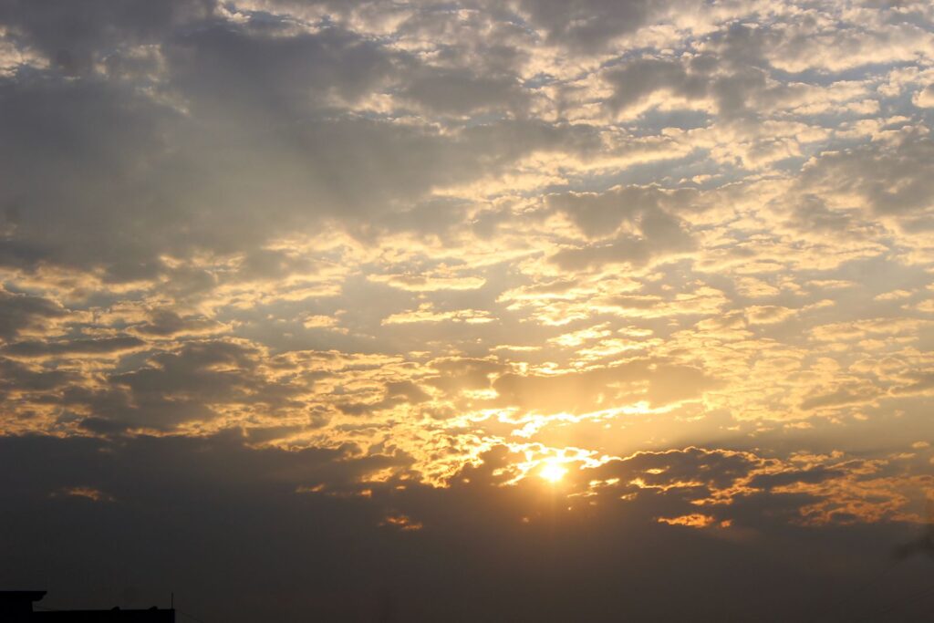 Sunrise over the clouds at Anand Vihar